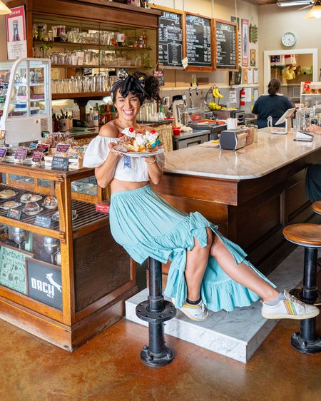 Enjoying tasty treats at Buda Soda Fountain, wearing my white off-shoulder crop top paired with turquoise tiered boho maxi skirt and Seychelles shoes

- spring outfit, spring dress, layered long skirt, floral head scarf bandana, Walmart finds, party outfit, date outfit, summer outfit, concert outfit, cowgirl outfit, travel outfit, vacation outfit 

#LTkStyleTip #LTKFindsUnder50 #LTKFindsUnder100 #LTKTravel #LTKGiftGuide
