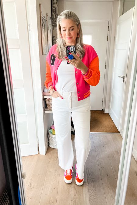 Ootd - Tuesday. Pink and orange cropped baseball jacket over a slim fit white t-shirt paired with white wide legged cropped jeans and suede Vans. 



#LTKstyletip #LTKmidsize #LTKover40
