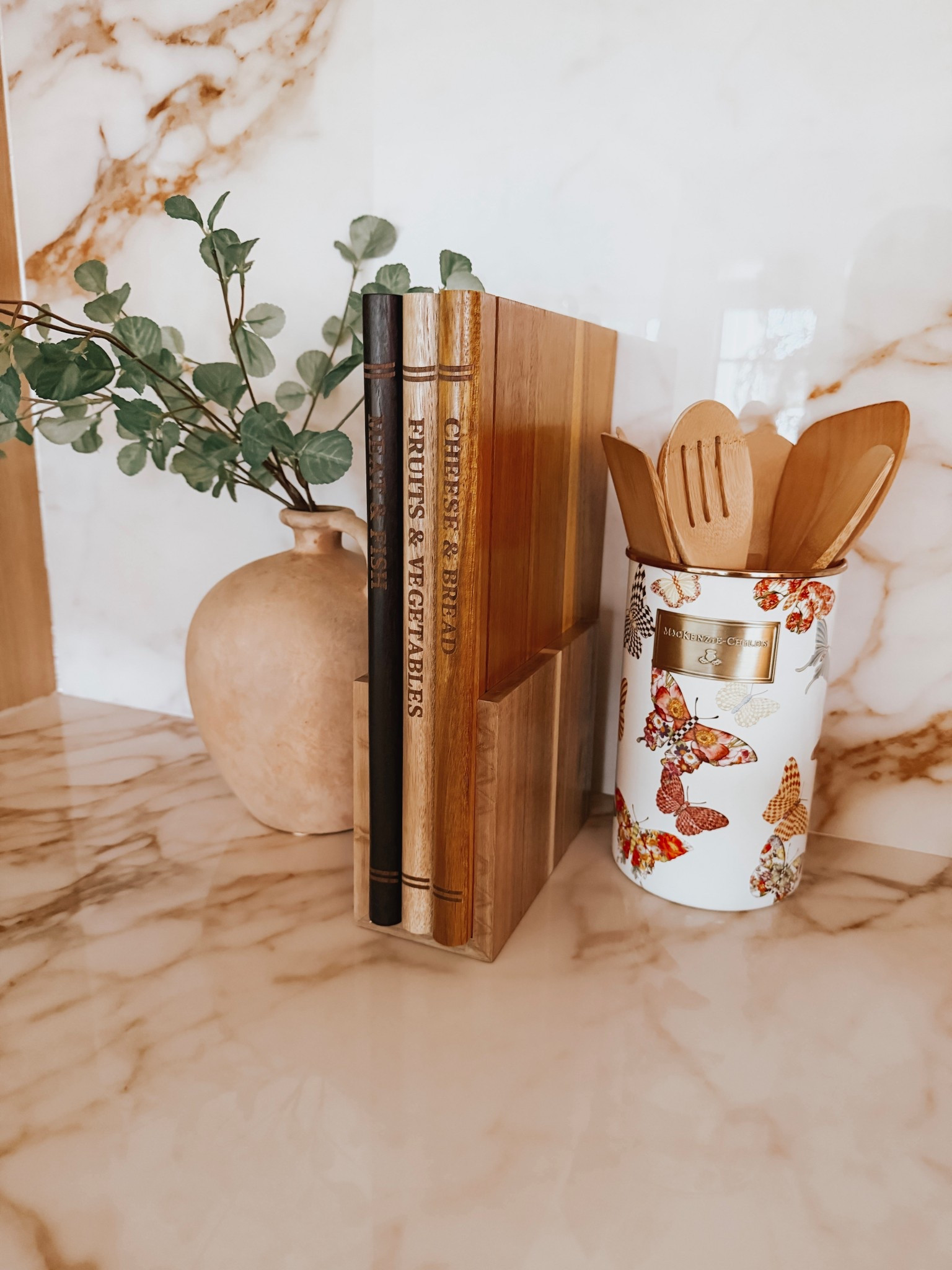Elevate your kitchen style with these book cutting boards, wooden spoons, and utensil holder! Perfect for prep and serving 

#LTKHome