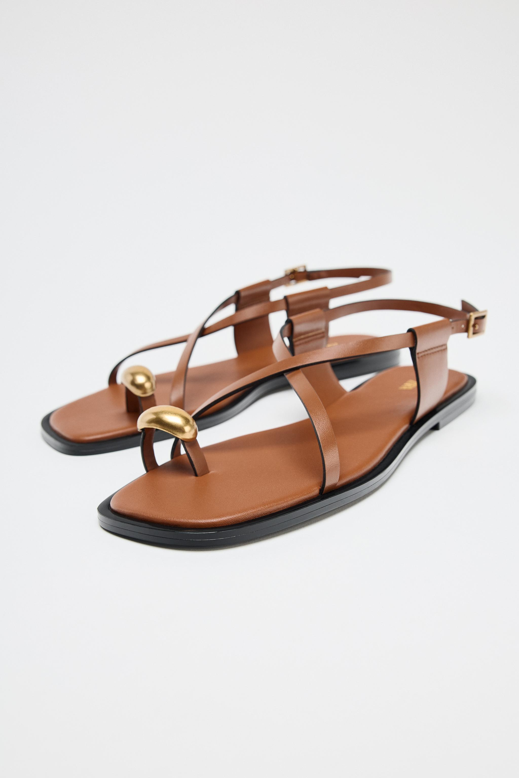 FLAT SANDALS WITH METAL TOE DETAIL29.99 GBPBrown | 1641/510/105Put it in your basketAddFlat sanda... | Zara UK