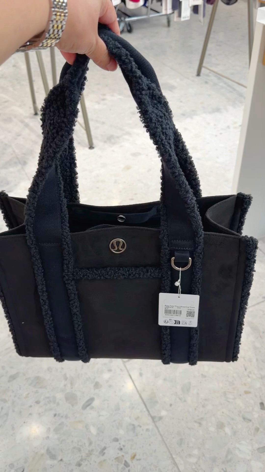 These Lululemon boxy faux shearling trimmed tote bags are so cute! I especially love this larger 10L size. Also comes in a smaller  4.5L size. Lots of other great totes available too and several other styles on sale including this same bag is a lighter neutral color combo. Great for everyday outfits and several bags are really good for workwear and travel too. 

Work bag, laptop bag, travel tote, travel bag, everyday tote, black tote, winter tote, winter outfit bag

#LTKWorkwear #LTKGiftGuide #LTKTravel