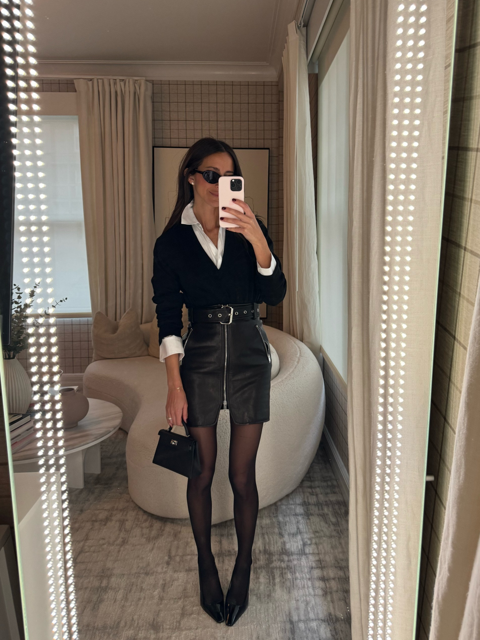 STYLE SESSION: How to style a leather skirt. Loving this one from Khaite

#LTKstyletip #LTKshoecrush #LTKSeasonal