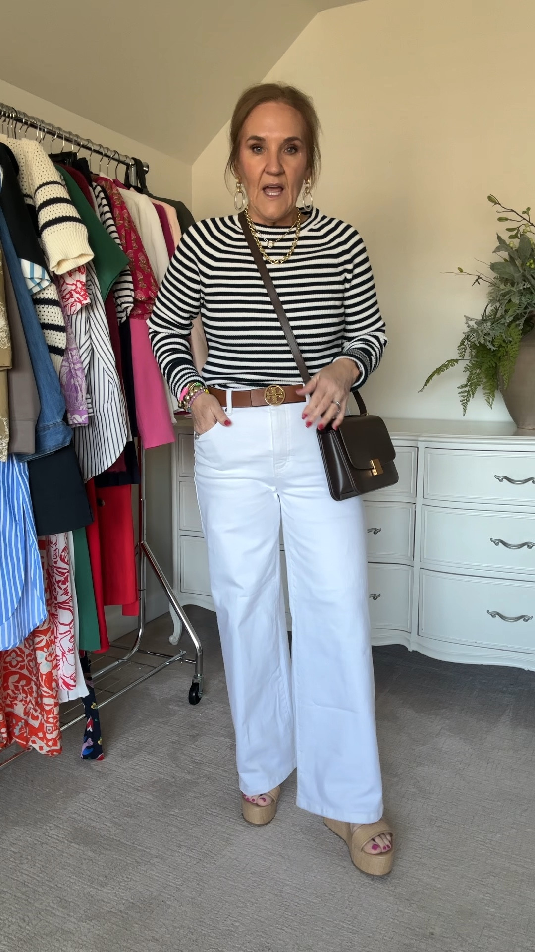 This navy white stripe sweater is ribbed, fitted and a medium weight. It’s lovely easily. Wearing a medium. 
15% off and free shipping on my favorite bra nanettefs15
White wide leg jeans log the heavier weight. There’s no see through! Size 29 reg Sweaters

Shoes I size down a half 15% off code NANETTE15
This is a beautiful leather bag. Could pass for hundreds!!!

Brown purse quince leather purse banana republic factory striped navy sweater 

#LTKItBag #LTKOver40 #LTKFindsUnder100