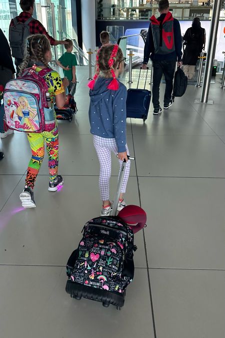 This kids travel backpack was perfect for our overseas vacation. It has an extendable handle and wheels, which allows kids to carry their own bags. Also this kids travel pillow came in handy during our long flight  

#LTKkids #LTKtravel #LTKfamily