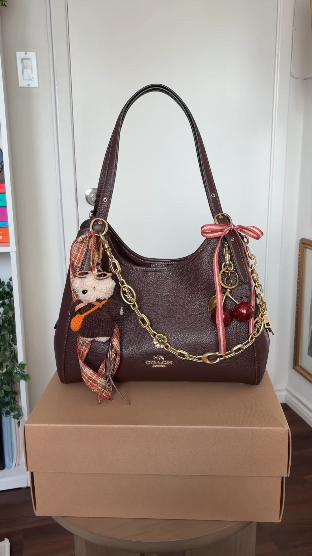 ready for october 🍁 Coach bag, Coach handbag, Coach purse, Coach shoulder bag, Coach hobo bag, brown Coach bag, dark brown handbag, brown shoulder bag, Coach bag accessories, handbag accessories, bag charm, purse charms, handbag charms, Coach bag charm, cherry bag charm, cherry accessories, fall handbag, fall purse, fall accessories, autumn accessories, fall fashion, autumn fashion, brown accessories, burgundy accessories, plaid accessories, tartan accessories, ribbon bag charm, bow bag charm, personalized handbag, decorated handbag, bag styling, handbag styling, purse styling, handbag collection, Coach collection, designer handbag, affordable luxury handbag, everyday handbag, classic handbag, timeless handbag, trendy handbag, cute handbag, statement accessories, fall outfit accessories, cozy fall aesthetic, preppy fall style, feminine accessories, vintage inspired accessories, handbag inspiration, fall fashion accessories
 

 #LTKdayinmylife #LTKgrwm #LTKootd