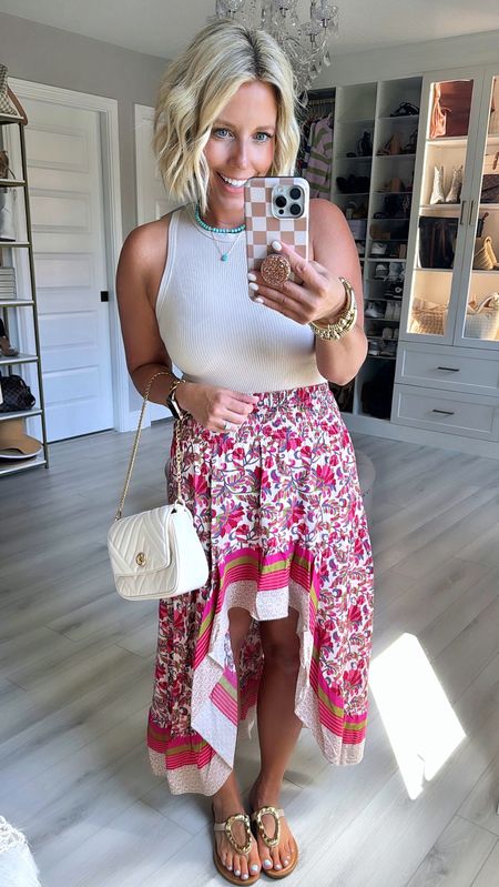 The print and the hi-low cut of this skirt is perfection!!!
⬇️⬇️⬇️
Tanks medium
Skirt small
Sandals sized up 1/2 size 

#LTKFindsUnder100 #LTKFindsUnder50 #LTKStyleTip