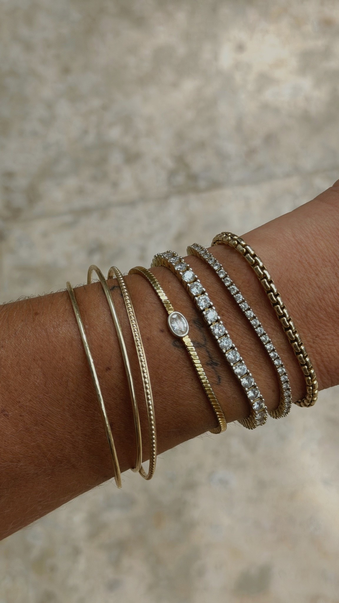 Bracelet Base Stack — they never come off. I mean never! Shower, swimming, tanning sweating all of it. They’re always on, xx.
