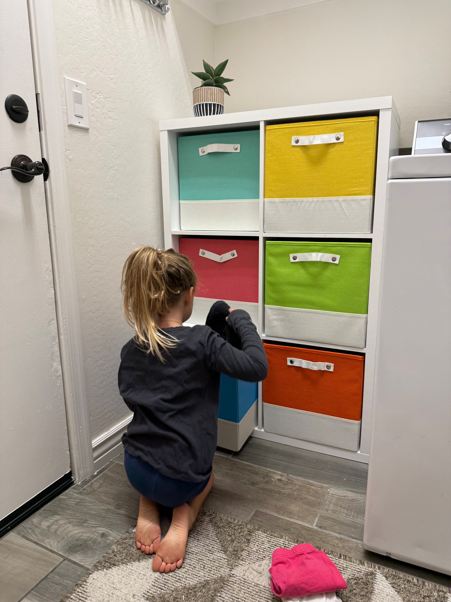 Colored laundry bins for sorting right away! 