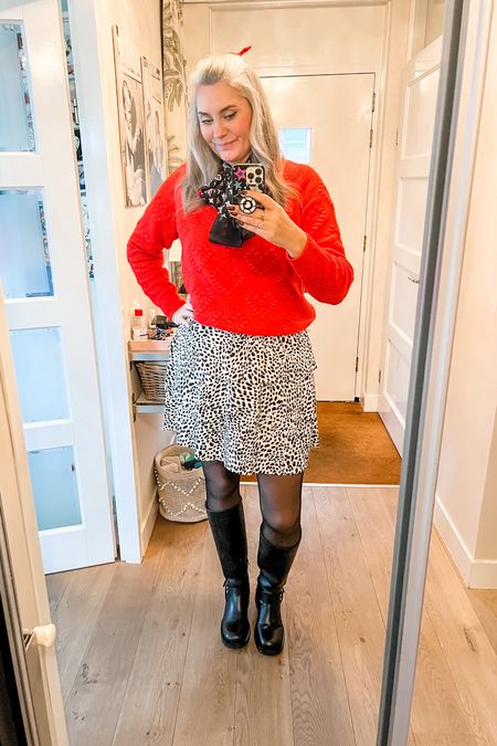 Ootd - Friday. Red wool blend sweater paired with a black and white print skirt, red bow in hair, tall motorcycle boots. 

#LTKgift 

#LTKeurope #LTKover40 #LTKstyletip