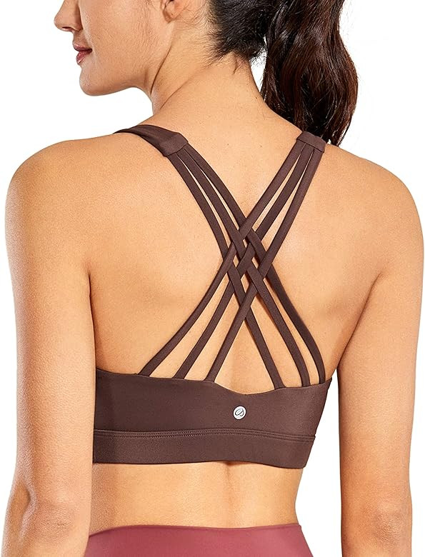 CRZ YOGA Women's Strappy Sports Bra Full Coverage Padded Full Size Criss Cross Workout Yoga Bra T... | Amazon (US)