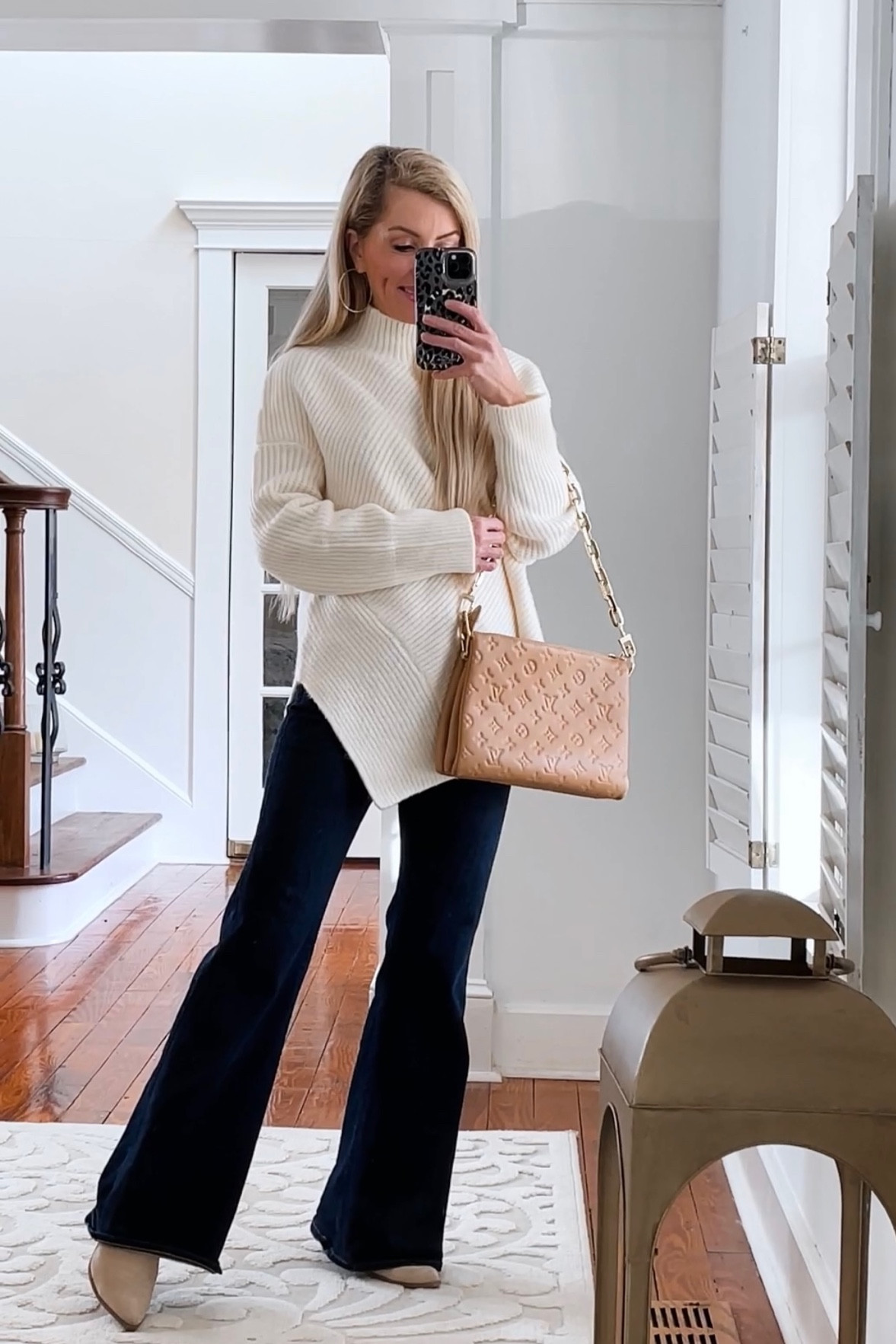 This sweater is the perfect tunic length to pair with leggings , I also style with jeans as well . The split side is such a chic pretty detail ! 🤍
Wearing :  XS 

Flare leg jeans
Jeans 
petite jeans 
Neutral outfit 
Tunic sweater 


#LTKstyletip #LTKSeasonal #LTKFind