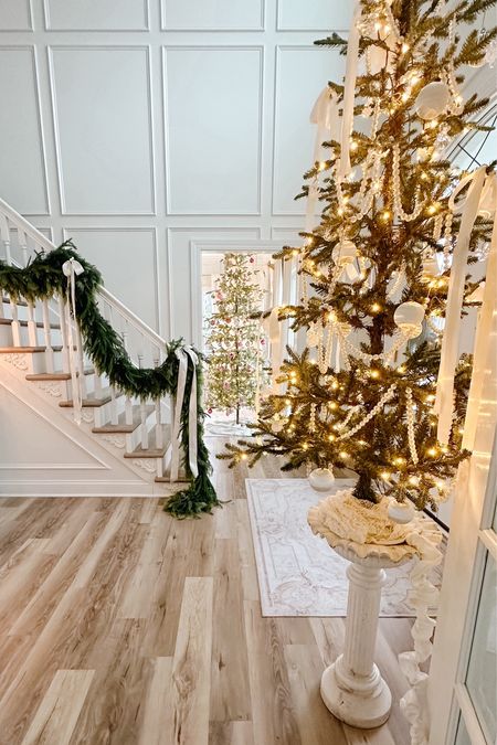 Decorating your Christmas tree doesn't have to break the bank. Over the past few years we've gotten away from filling our trees to the brim with ornaments and have embraced a more simplistic approach. We love dressing up our Christmas trees with vintage ornaments, ribbon, and unique pieces, creating a beautiful vintage vibe. It's a blend of our love for nostalgic charm and the creativity of repurposing what we already have. This approach brings a unique, personal touch to our holiday decor. 

Think outside the box when decorating your Christmas tree: a cast iron garden urn can be a unique tree base, while an old piece of lace or faux fur adds a touch of elegance. Ribbon, often on sale during the holiday season, can create a beautiful, festive look. Vintage satin ornaments are not only affordable but also easily found on Etsy or eBay, adding a touch of nostalgia. 

Don't overlook practical items like a lamp cord cover, perfect for discreetly hiding your Christmas tree cord. And simple garlands can be transformed – like my pearl garland from HomeGoods. I removed the wooden stars, and now it radiates a lovely vintage charm.  Remember to do what you love, not about following the last
trends. #BudgetFriendlyDecor #ChristmasTreeIdeas #VintageChristmas #target #homegoods #christmastree #christmasdecor

#LTKSeasonal #LTKHoliday #LTKhome
