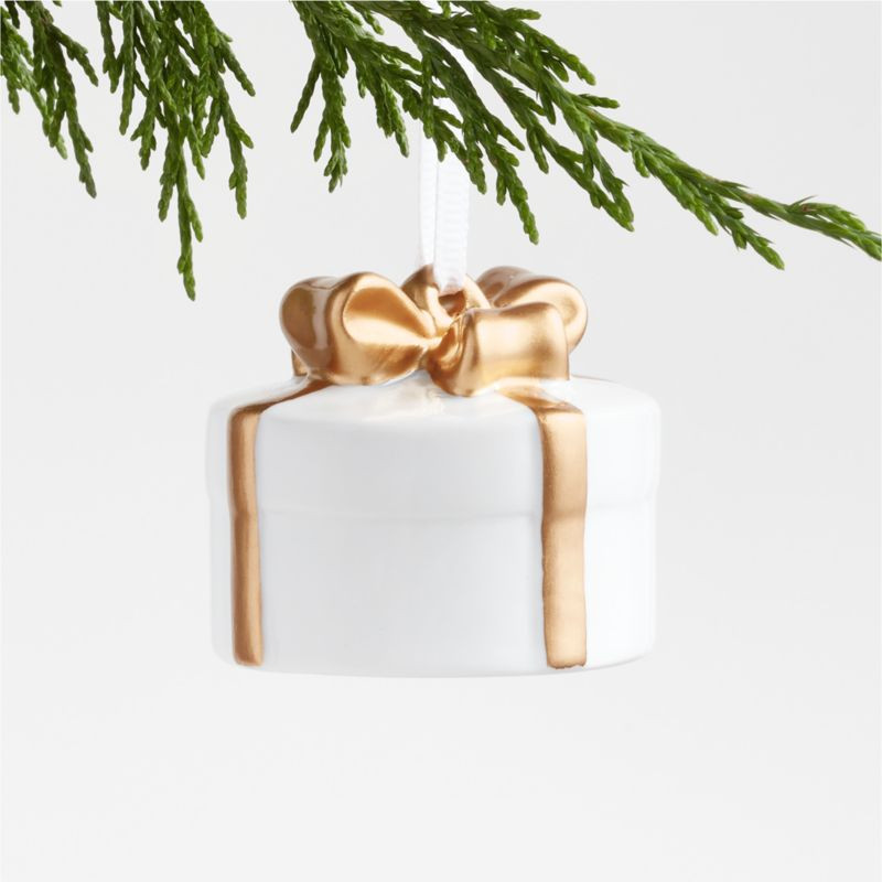 Round White & Gold Ceramic Christmas Present Ornament + Reviews | Crate & Barrel | Crate & Barrel