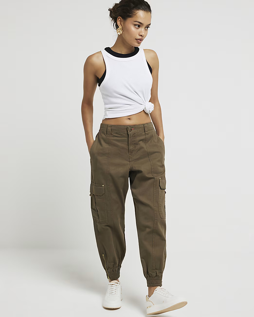 Petite khaki zip cuffed cargo trousers | River Island (UK & IE)