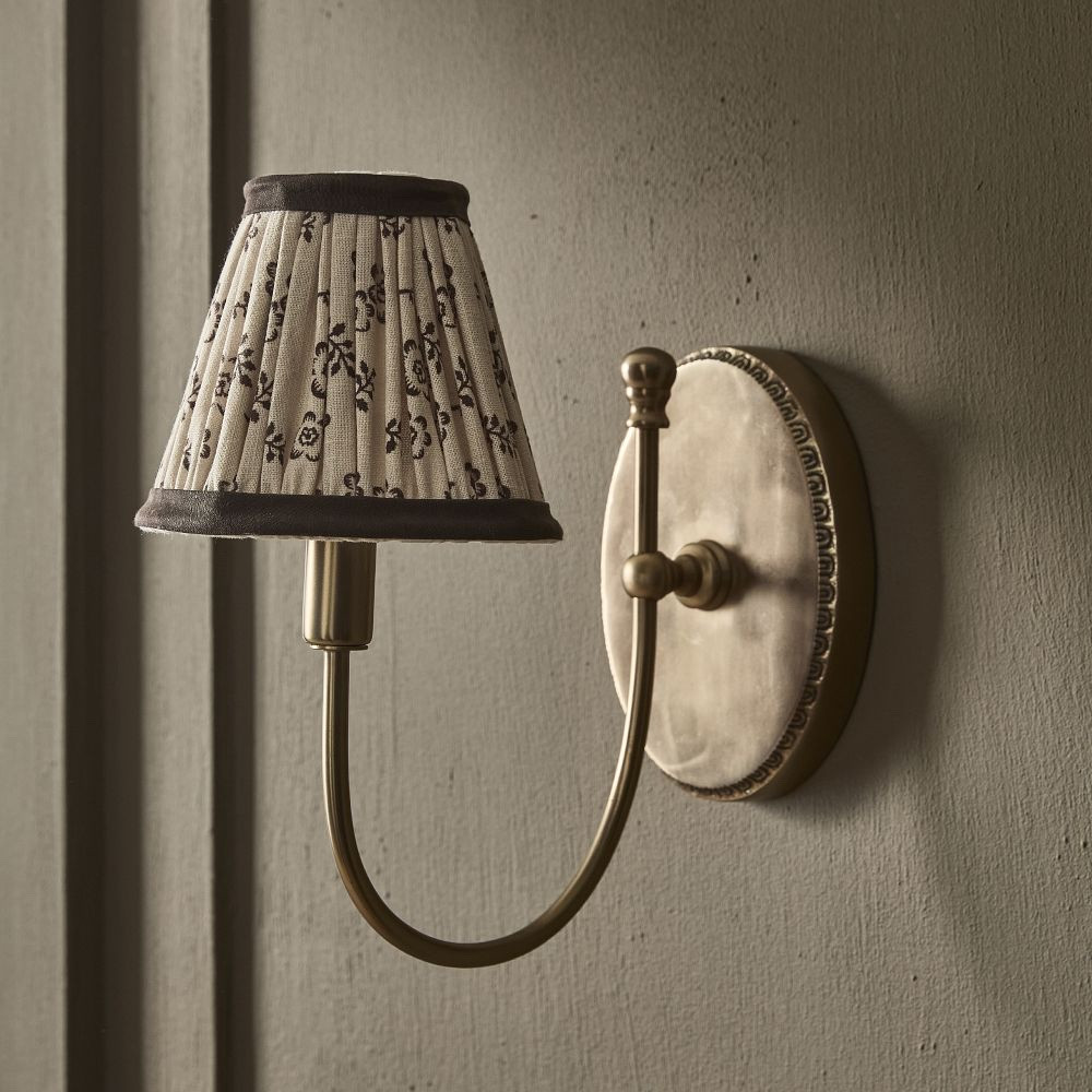 This printed sconce shade is such a small detail, but it makes a huge impact. The soft floral pattern and warm brass tone give that collected, vintage-inspired look I love—perfect for cozy bedrooms, hallways, or living rooms. It’s the kind of piece that instantly adds charm and character without overpowering a space.

printed sconce shade, vintage inspired lighting, cozy home decor, traditional home style, brass wall sconce, cottage style lighting, classic wall lighting, neutral home decor, floral lamp shade, layered lighting, bedroom lighting ideas, hallway lighting, warm home aesthetic, timeless interior style, European inspired decor

#LTKHome