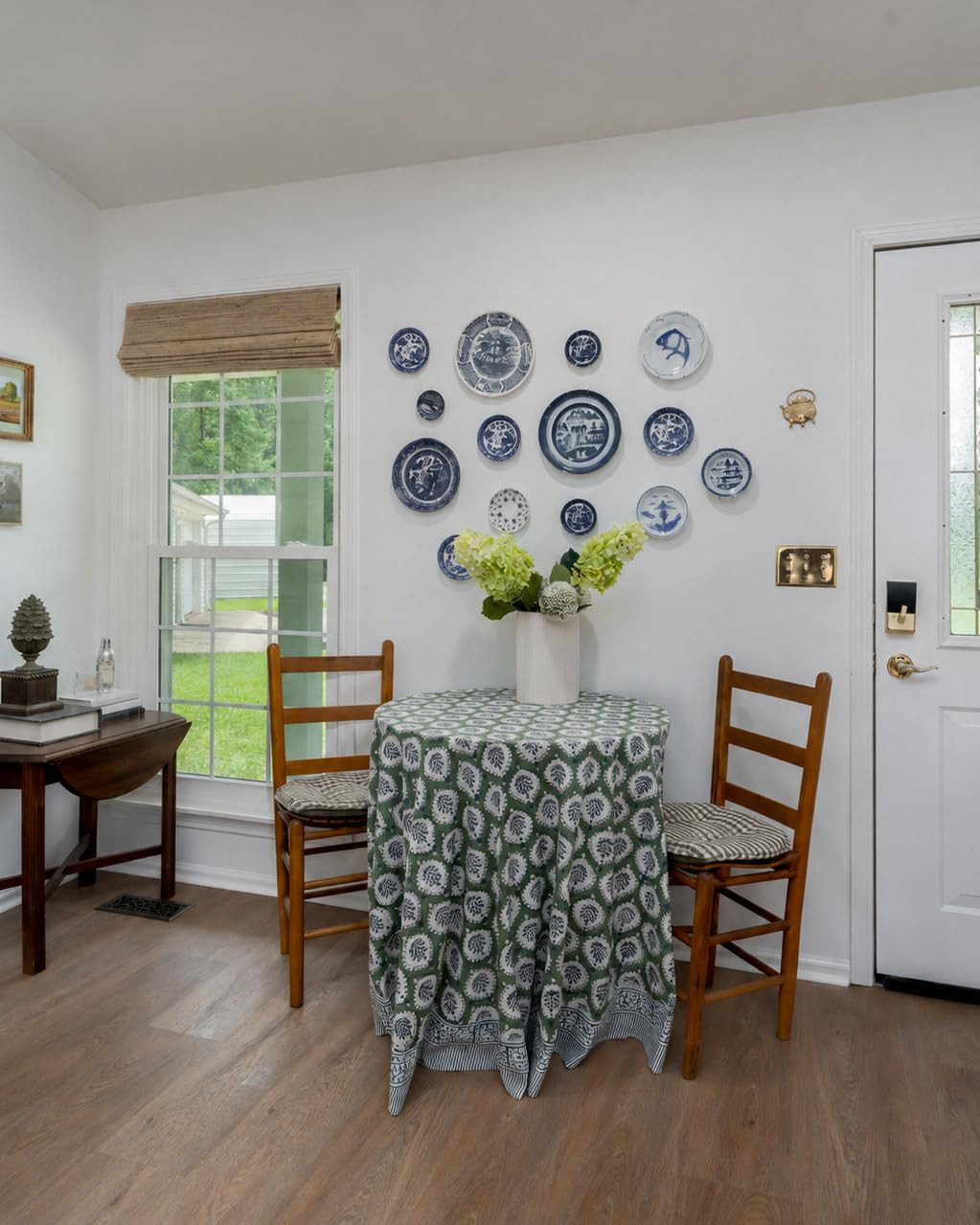 Cottage-style Amazon home finds! Bamboo Roman shade in color: Beige, privacy lining, no edge binding, front balance. 30 inch round table with 90x90 round table cloth, gingham cushions and vintage blue and white plate hangers 

#amazonhome 

 #LTKdayinmylife #LTKmorningroutine #LTKHome