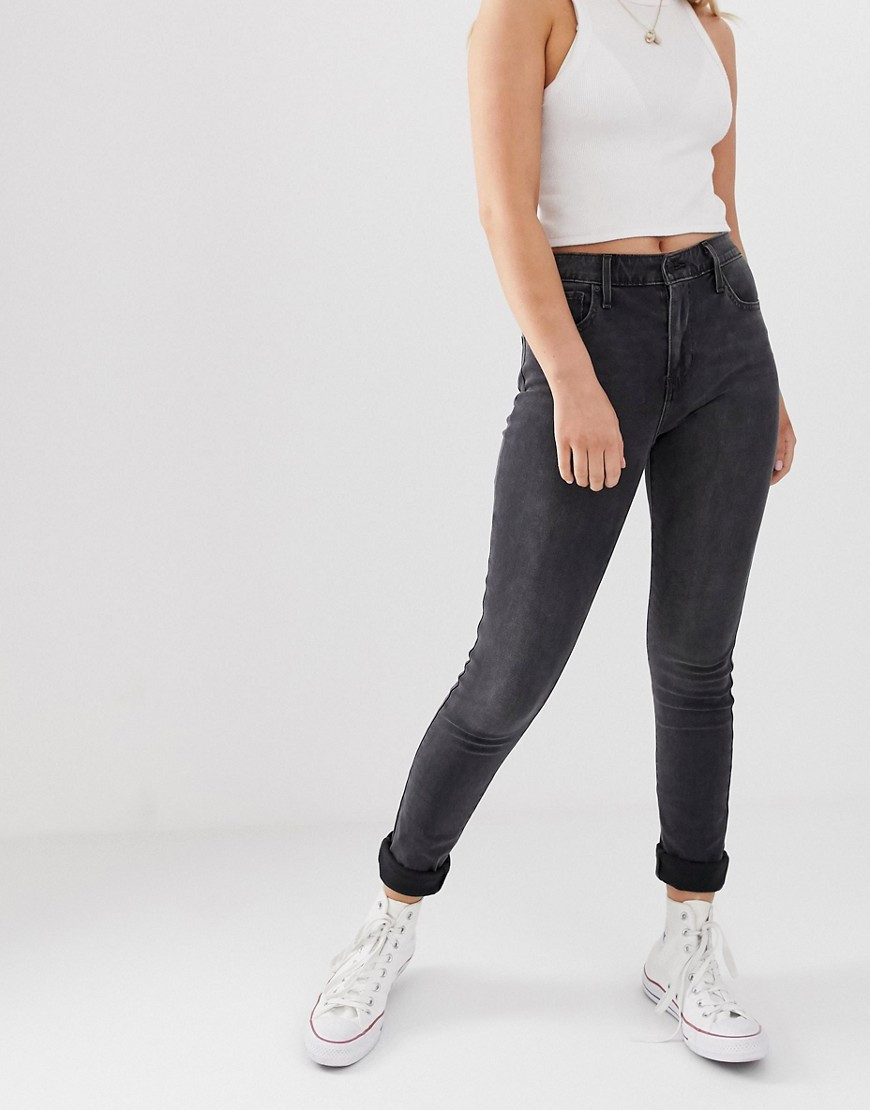 Levi's - Jeansy 721 o obcisłym kroju z podwyższonym stanem-Czarny | ASOS (Global)