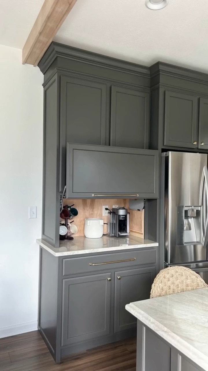 Adding this DIY “Appliance Garage” has given us the clean, not so cluttered look we wanted…as well as deeper storage inside so we can store even more in the upper part of the cabinets 🙌🏻

This cabinet built took some trial & error (mainly with the door as we had to match our existing cabinet doors) but it was all worth it! 

*where we live, having an outlet in this cabinet is perfectly fine. Not all countries have the same codes 😊

Would you add a deeper storage cabinet too?

#buildergradetocustommade #buildergradeupgrade #budgetdiy #diyproject #kitchenupdate #appliancegarage

Appliance garage
Rejuvenation hardware
Coffee station

#liketkit
@liketk.it



#LTKHome #LTKWatchNow
