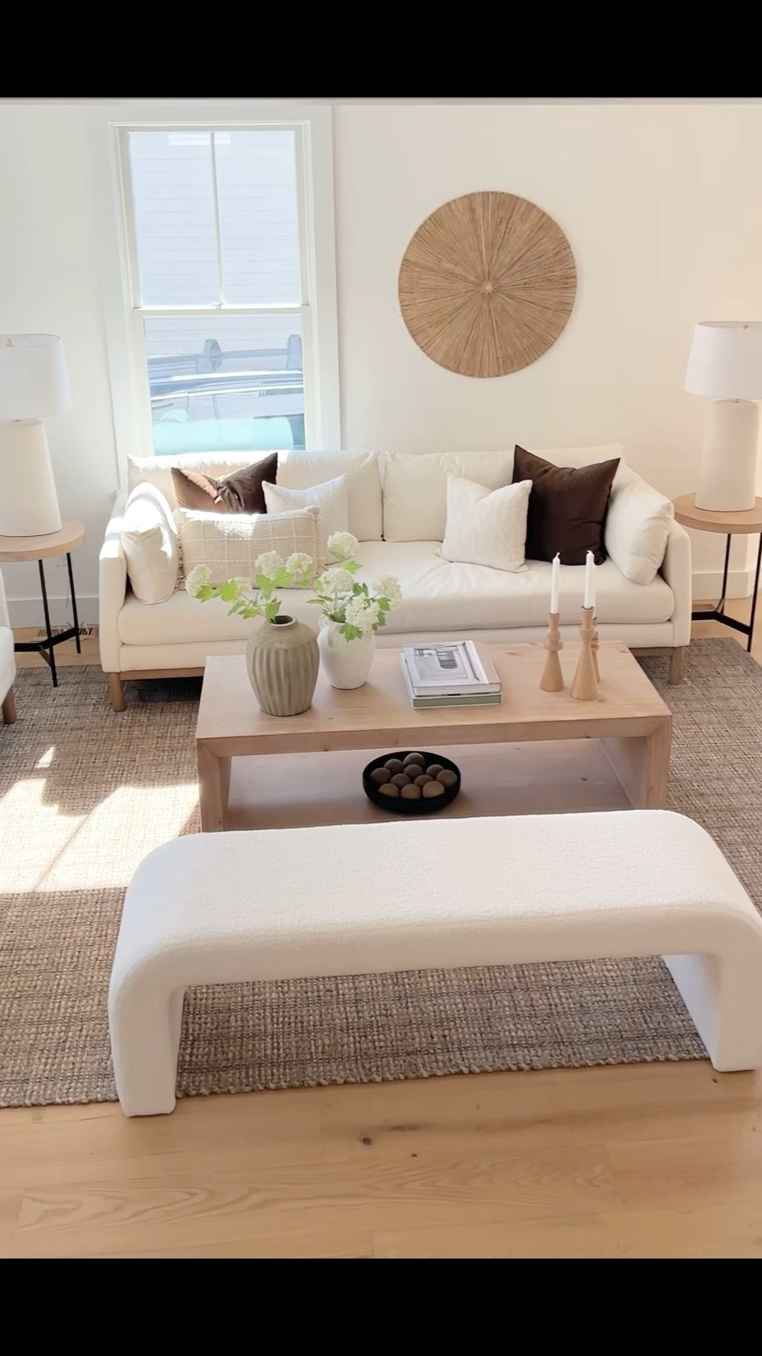 Modern, organic and coastal.  Cream sofas, light wood coffee table.  Cane backed dining chairs.

#coastal #sofa #diningchairs #diningtable

#LTKHome