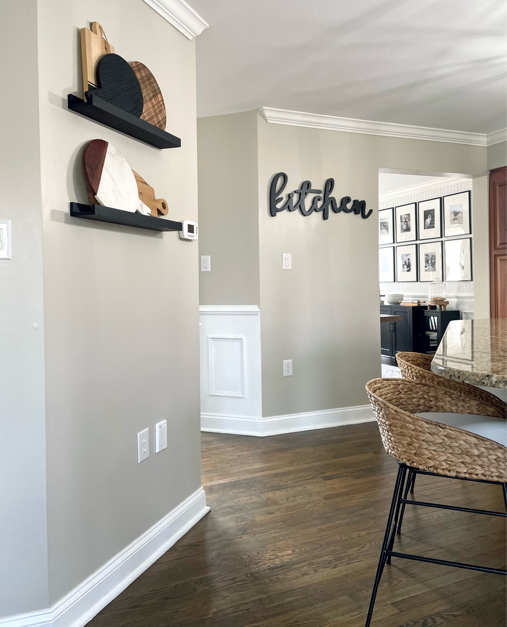 Kitchen decor:
Black floating wall shelves
Cutting board wall display
Woven bar stools
Gallery wall

#LTKunder100 #LTKhome