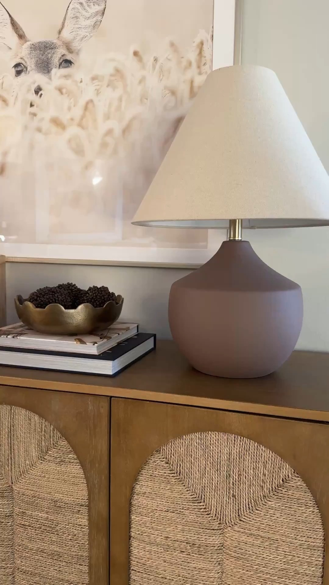 This Nathan James two-piece console set has truly been a game changer for our family. It functions as a mini home library + hidden storage, while still feeling beautiful and intentional in our foyer.
I love styling the tabletop (clearly… because I’m still obsessed with this setup 😅). And this lamp—the shape gets me every time. It’s one of those timeless pieces I know will move with us and work in so many spaces over the years.
But honestly? The console table itself is the real showstopper. It grounds the entry, adds warmth, and makes our foyer feel finished the second you walk in.
Everything linked on LTK ✨
#ltkhome #entrywayinspo #consoledecor #foyerdesign #homelibrary #neutralhome #timelessdesign #familyhome 

#LTKHome