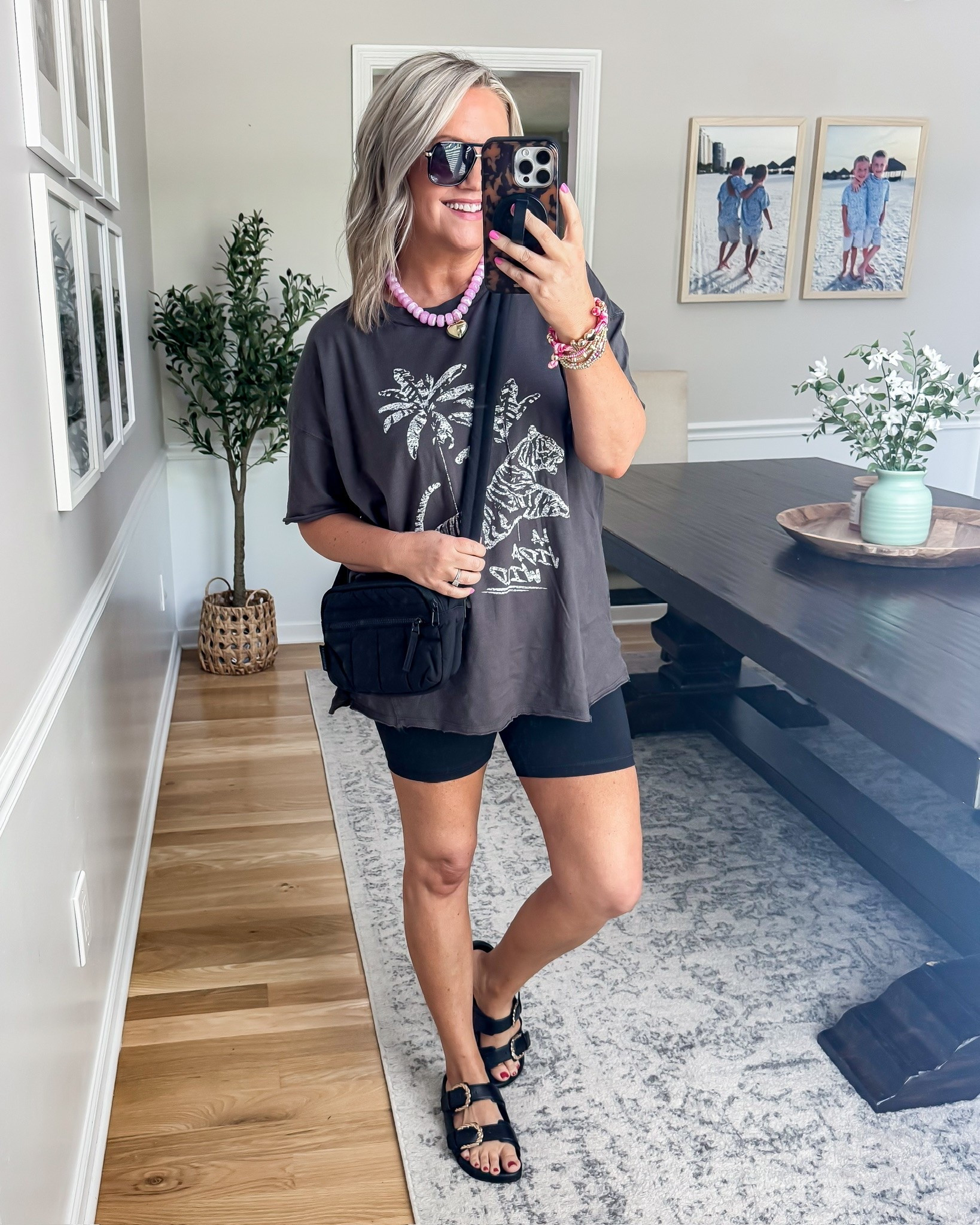 This oversized graphic tee and biker shorts combo is one of those easy throw on outfits that still feels put together. I love the washed charcoal color with the fun tiger graphic, and the crossbody bag makes it perfect for errands, travel days, coffee runs, or casual weekends. Comfy without looking boring is always the goal.

graphic tee outfit, biker shorts outfit, casual everyday style, comfy mom outfit, oversized graphic tee, airport outfit idea, athleisure outfit, trendy casual look, summer mom style, tiger graphic tee, running errands outfit, comfy cute outfit, lovelylifestyling

#LTKmomlife #LTKOver40 #LTKSeasonal
