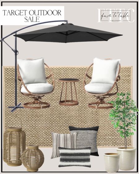 Target Outdoor Sale. Follow @farmtotablecreations on Instagram for more inspiration. Rocking Patio Chairs. Opalhouse Patio Furniture. Seagrass Basketweave Area Rug. Patio Umbrella. Artificial Ficus Tree. Threshold Ceramic Glaze Planter. Resin Natural Lanterns. Threshold Outdoor Pillows. Outdoor Lumbar  

#LTKSeasonal #LTKsalealert #LTKunder50