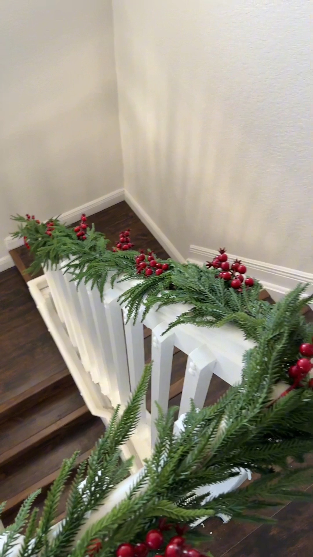 Holiday staircase . Stockings were purchased years ago on target 

#LTKHome #LTKSeasonal #LTKHoliday