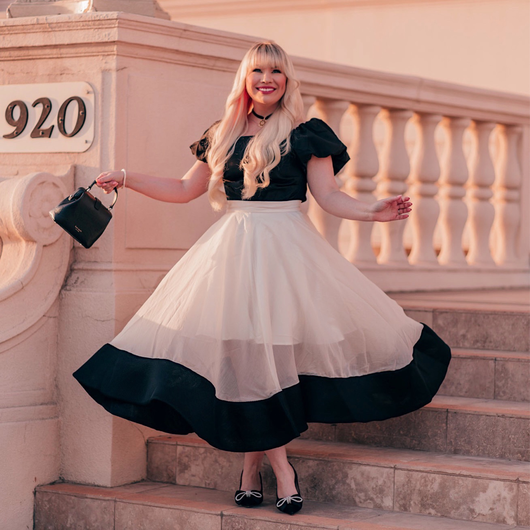 Grace Kelly inspired outfit with black puff sleeve top and black and white skirt. Great holiday outfit idea! Both from Chicwish and TTS #chicwish #holidayoutfit

#LTKHoliday #LTKstyletip #LTKunder100