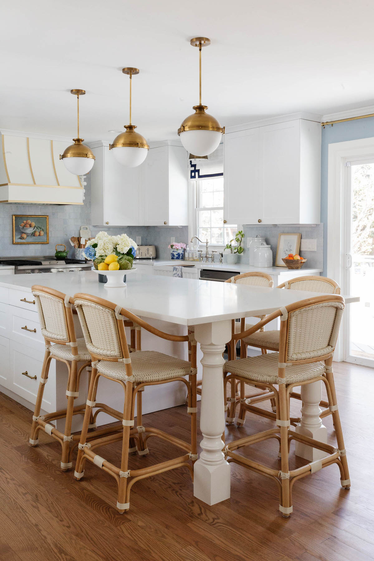 Our most-loved kitchen design ever—this Grandmillennial space layers classic charm with fresh updates: semi-handmade cabinets, a custom vent hood, rattan stools, and brass details. Timeless, not trendy. See below to shop the look and recreate the charm in your own home.

#ltkhome #ltkinterior #grandmillennialstyle #kitchendesign #traditionaltouches #blueandwhitekitchen #interiordetails #kitchenstyling #classicinteriors #peggyhaddadinteriors #semihandmadekitchen #kitchengoals #collectedhome #kitcheninspo
 

 #LTKHome #LTKFindsUnder50 #LTKFindsUnder100