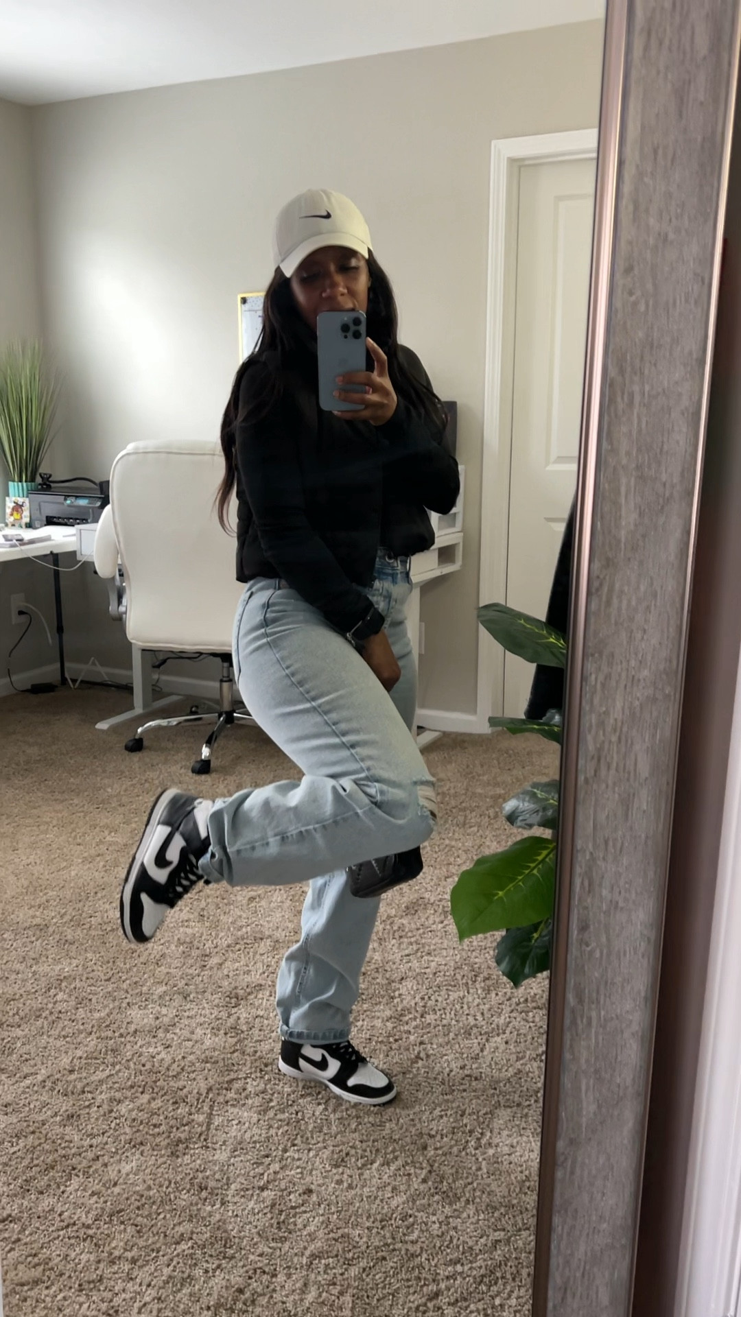 Casual sneaker outfit. I’m wearing a black long sleeve shirt, black puffer vest, high waisted distressed jeans, white Nike hat, black purse, and Nike Dunk High sneakers

#LTKStyleTip #LTKShoeCrush #LTKPetite