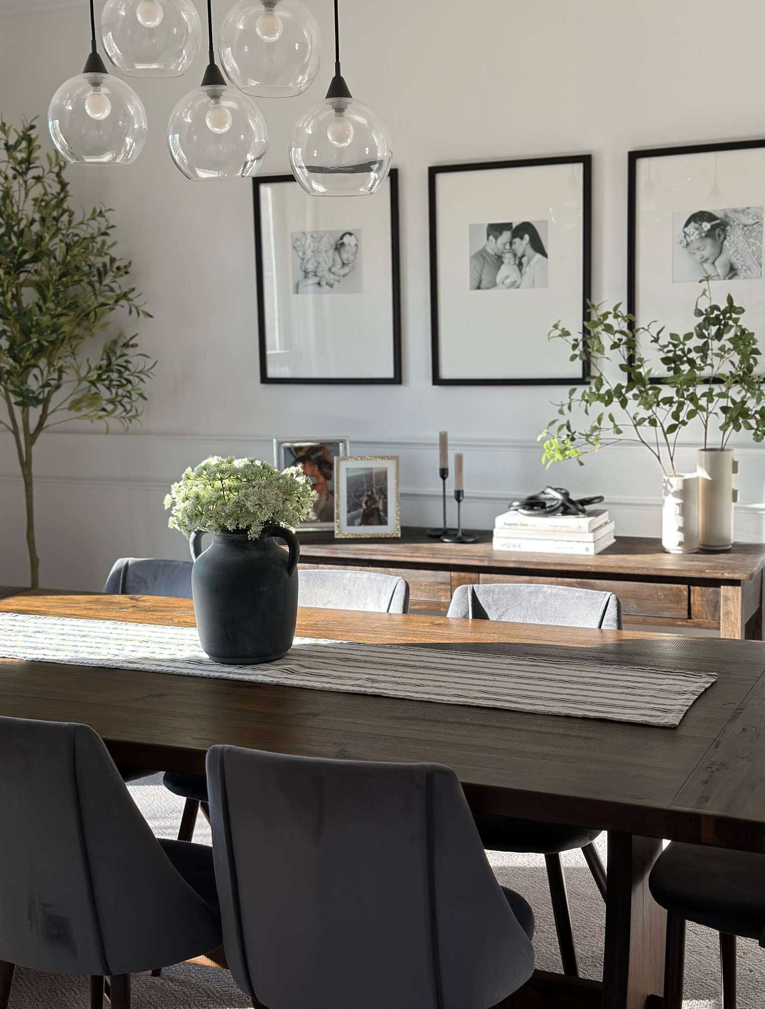 Neutral dinning room decor with frames from Target, wood dinning table and console table. 

#LTKHome #LTKSeasonal #LTKFamily