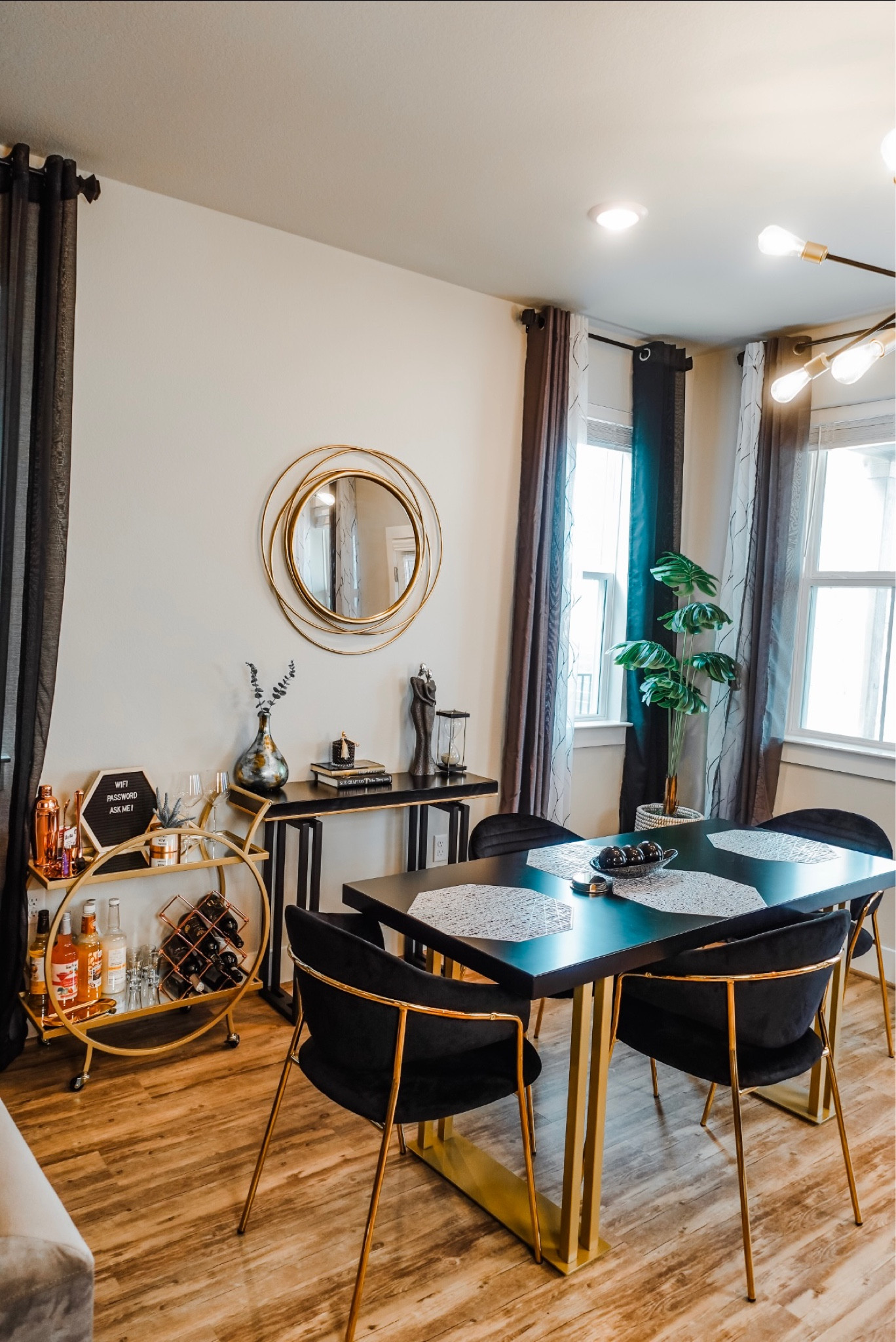 Black and gold themed dining area. 

#LTKstyletip #LTKU #LTKhome