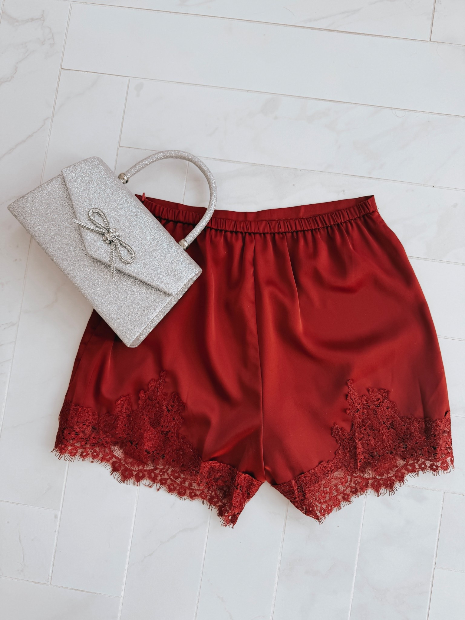 Get ready for an evening out with this elegant sparkly clutch and chic lace trim shorts! Perfect for a night on the holiday town. 

Loving all the little details and sparkle for the holidays! 

#LTKSeasonal #LTKHoliday