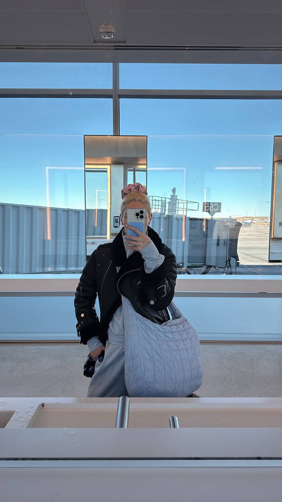 COZY MONOCHROME TRAVEL OUTFIT

This two piece coordinate sweat set is perfect for flights during the holiday season and comes in tons of bright pastel and neutral colors.

I love pairing it with this crossbody bag that looks like the free people puffer bag. It holds a surprising amount of stuff including a laptop, skincare for the flight, and other travel essentials like chargers and books.

I also can’t live without my sleepy tie scrunchie that preserves your blowout. Just take it out upon arrival and have perfectly bouncy hair! 

#LTKtravel #LTKfindsunder100 #LTKGiftGuide