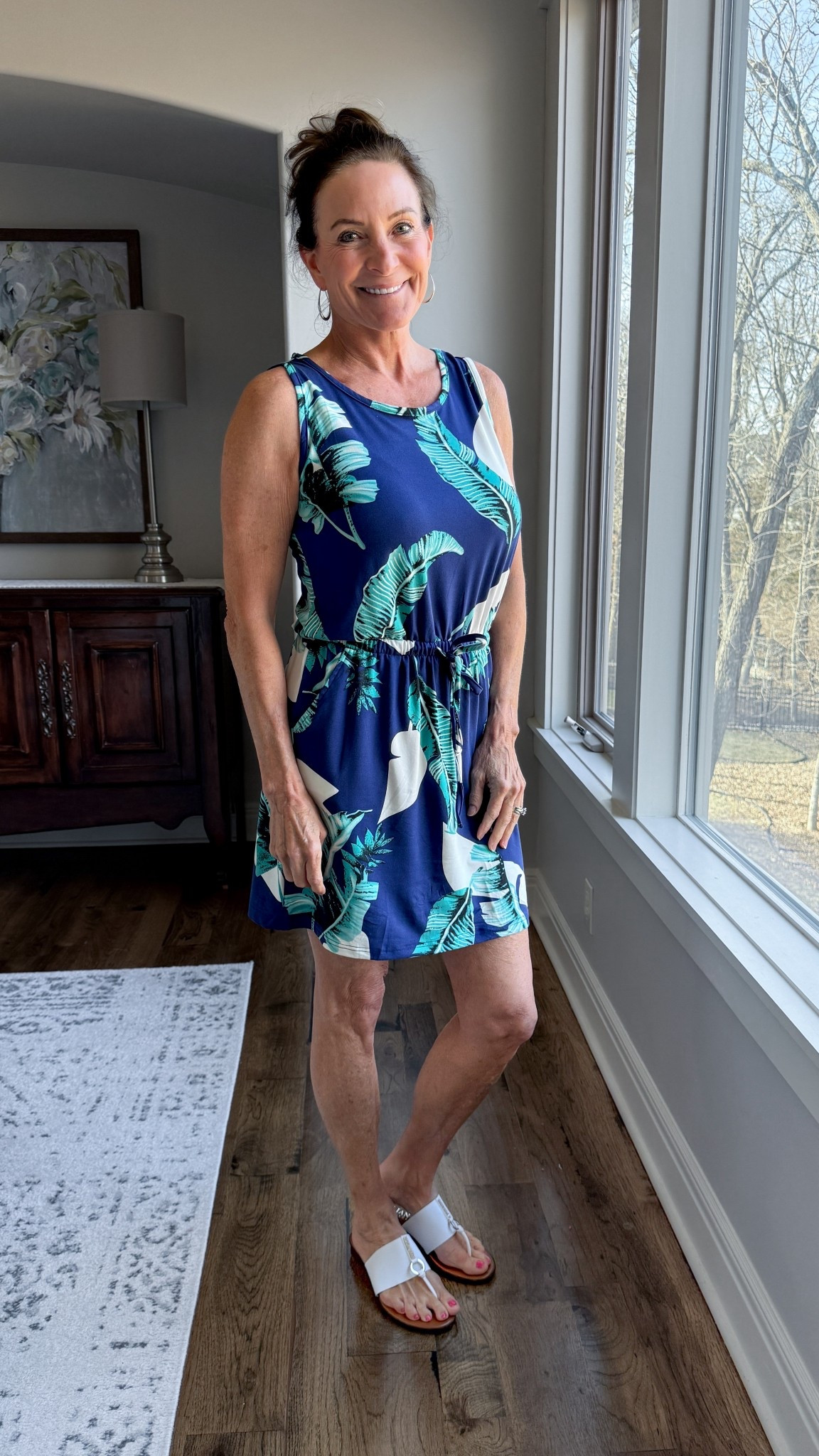 One dress. Instant getaway energy. 🌴

This navy palm print dress is the definition of effortless travel style — lightweight, waist-defining, and easy to move in. It’s the kind of piece that works for resort mornings, cruise dinners, or summer date nights without overthinking it. I used it as a coverup on my recent tripp

Why it works:
• Drawstring waist = shape without restriction
• Bold print = statement without accessories
• Neutral sandals keep it clean and elevated

Pack lighter. Choose pieces that do the work for you.

#AmazonStyle #TravelStyle #StyleOver40 #ResortWear #ModernMidlifeStyle