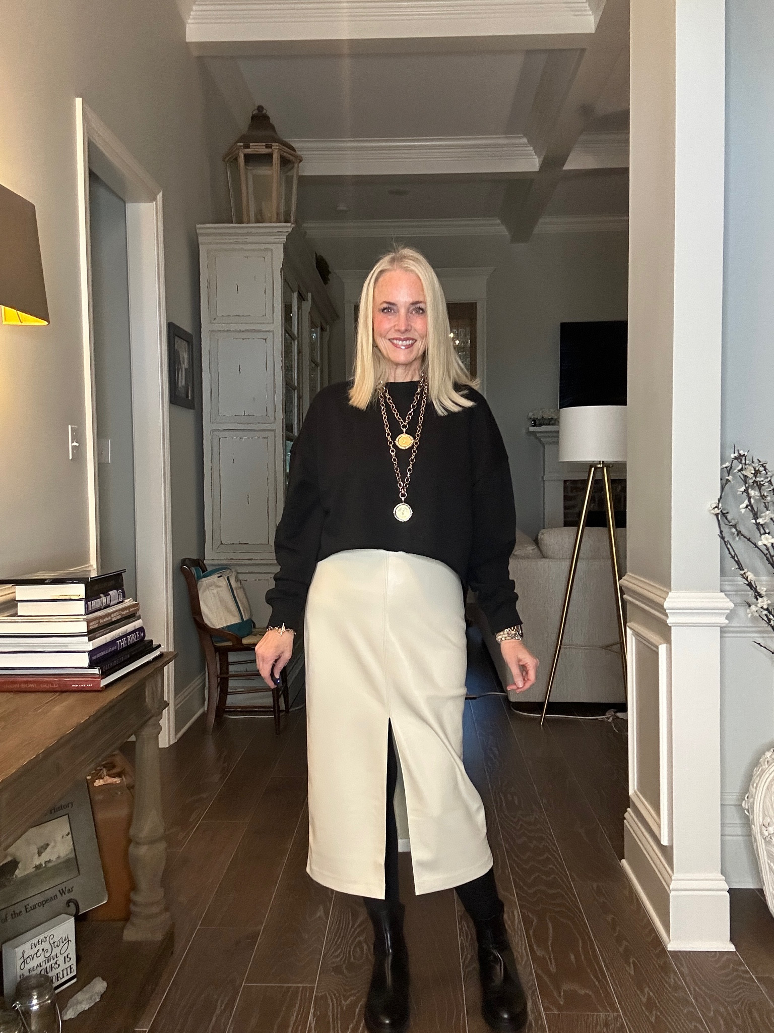 Ummm this vegan leather midi skirt from Gap is on sale for $39. Comes in multiple colors and lengths (petite, regular, tall). This is 3rd color in this skirt, and I’ve already worn them multiple times. The quality is unmatched by ANYTHING in this price point! If you want this you need to order STAT because they are flying off the shelves.

I’ve paired it with a black cropped sweatshirt from Target, a fitted long sleeve ribbed tee from Amazon, opaque fleece-lined tights and Chelsea boots. The look is polished off with my everyday jewelry and my favorite pieces from Jennifer Ponson Designs. 

As a reminder for reference, I’m 53, 5’8, 140ish lbs and am wearing a 6 regular in the skirt and large in the sweatshirt (for added length)  

#LTKmidsize #LTKsalealert #LTKworkwear