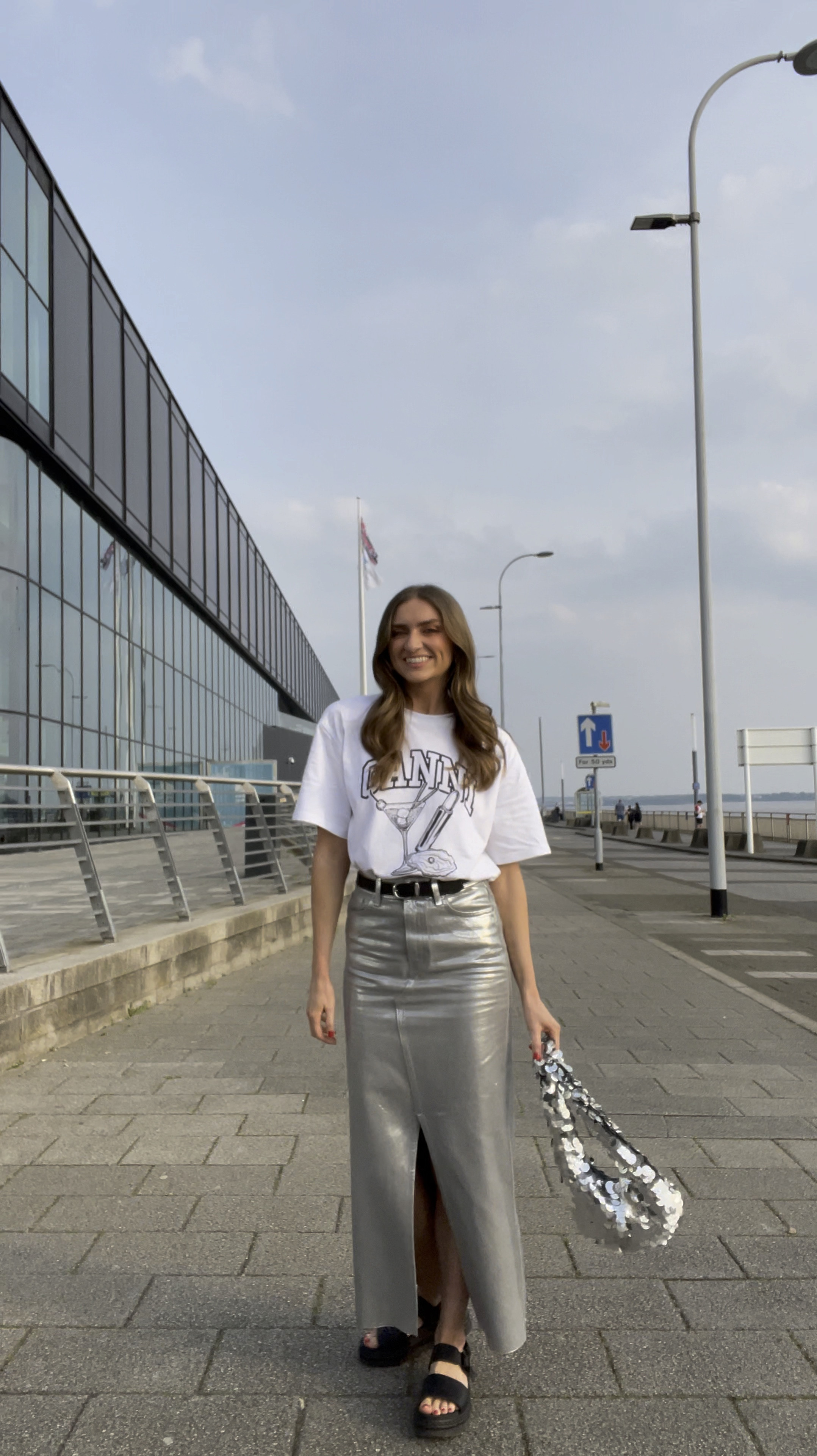 Saturday night outfit 
Wearing…
A medium in the Ganni cocktail t-shirt

A size 8 regular in the M&S COLLECTION Denim Foil Metallic Maxi Skirt 
I’m 5ft 6

Isabel Marant black leather belt with silver buckle

Dr Marten Voss sandals

M&S sequin silver bag 

Saturday evening outfit, silver skirt, disco outfit, eras tour, sequin bag

#LTKeurope #LTKuk #LTKpartywear