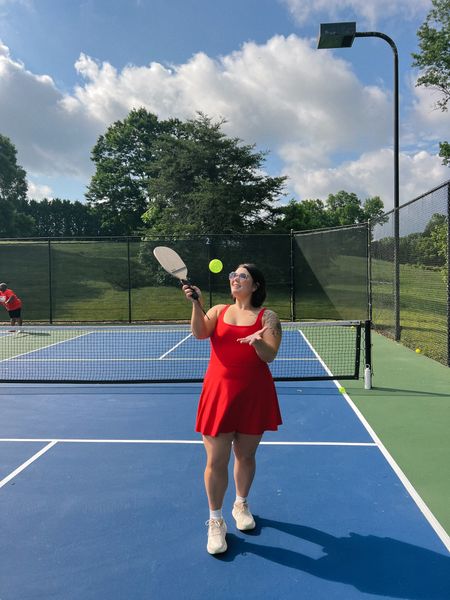 What I wore for our last day of the Lexus Wellness Retreat for a morning of pickle ball (I was not good lol). I ended up not liking the outfit I put on so Bonnie let me borrow her Spanx athletic dress and I loved it. I love a red. Size XL. Perfect for the midsize gal. Wore my hokas and my new $15 Target sunglasses  

#LTKmidsize #LTKfitness #LTKActive