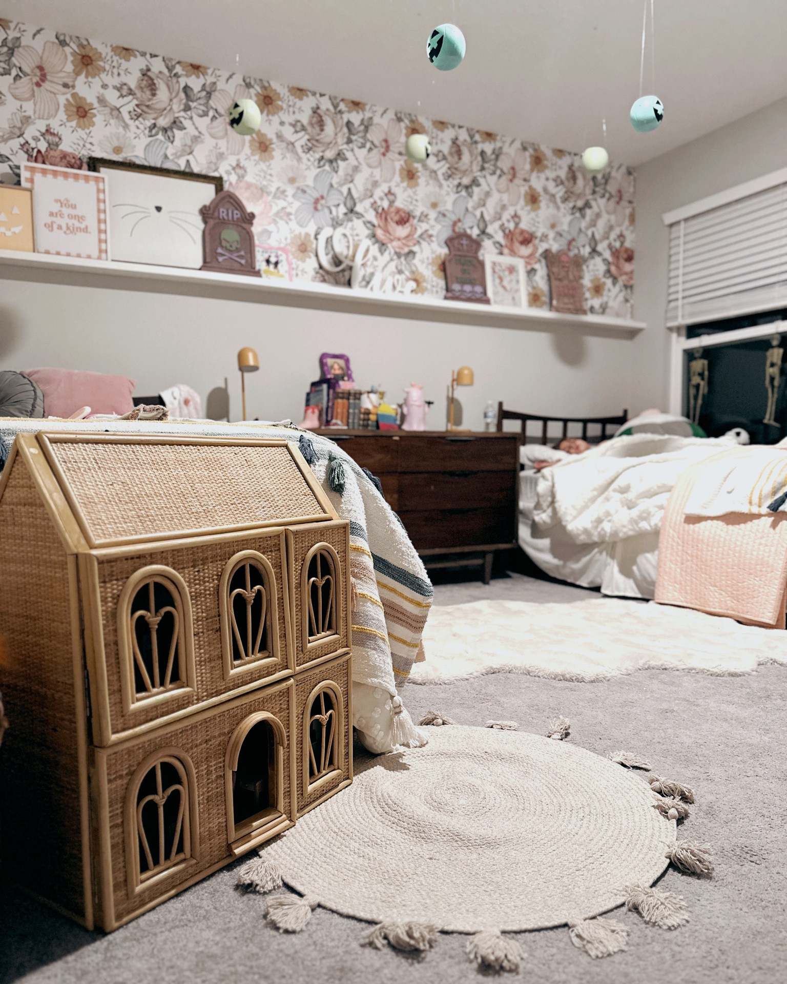 A little girls version of spooky season!  Tiny pumpkins hanging from the ceiling and painted graves to match the color scheme! 
#girlsroom #halloween #homedecor

#LTKhome #LTKHalloween #LTKSeasonal