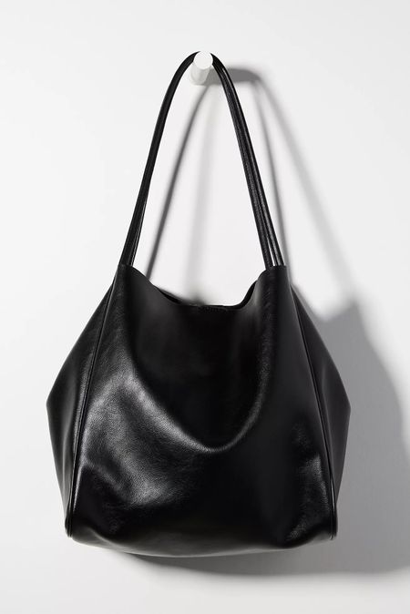 Giant toe bags are coming back in style! This faux leather tote bag is a universally matching choice with any outfit and is a fall outfit staple. Comes in 4 gorgeous neutral shades.

Neutral tote bag
Black tote faux leather tote bag
Faux leather purse
Faux leather bag
Olive tote bag
Cognac tote bag
Brown tote bag
Cream tote bag
Faux leather accessories

#LTKunder100 #LTKSeasonal #LTKitbag