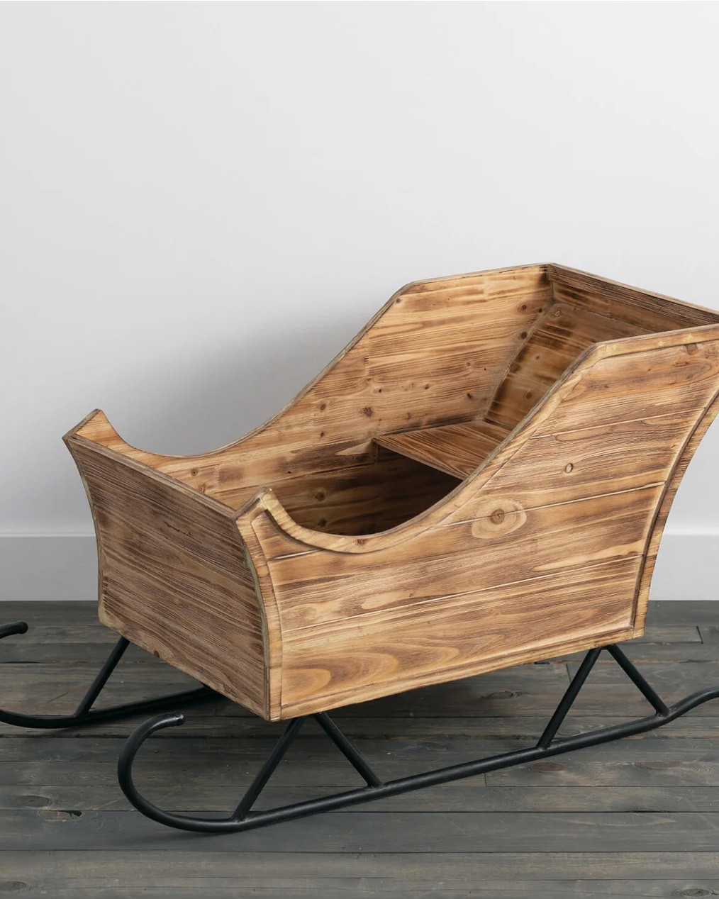 The gorgeous sleigh is perfect as a tree stand! This is solid wood sleigh that measure 42”L x 19W x 24”. Here’s a few tips that answer many of the questions I’ve been asked. 

1. The most important tip that I can give you if you plan to use it in the way that I have is to measure your tree stand first. The sleigh base size is 17” wide x 21”  an our 22 inches stand fixed perfectly on an angle.

2. The tree that I’m using in this image is 7 1/2 feet tall. It is not wobbly as many think it might be. That said,  anything slimmer would most certainly be wobbly. I also think that anything taller might look a bit funny and ultimately it won’t fit because the stand will be too large.

3. The sleigh does not come assembled. It has 5 pieces and it’s super easy to put together. The wood smells fantastic too! 

Let me know if you have any questions about the slay and I’m happy to answer . #LTKVideo 

#LTKSeasonal #LTKStyleTip