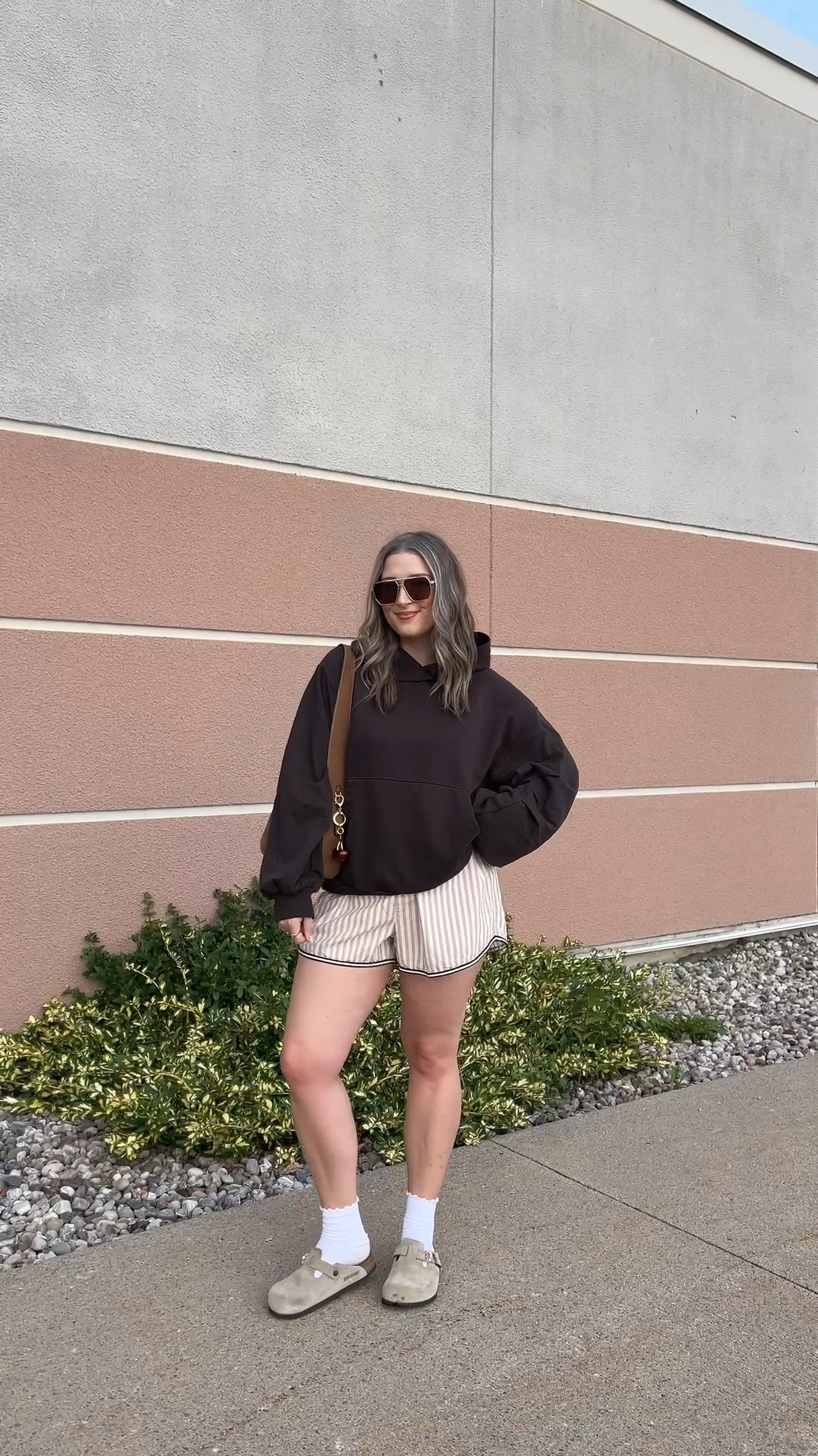 Comfy early fall outfit! Wearing M in the chocolate brown hoodie. Wearing L in the striped boxer shorts but should have done M (exact Canadian shorts link under “similar products”). I’m a 9.5-10 shoe and wear a 40 in the Birkenstock clogs

#LTKfall #LTKsale #LTKmidsize