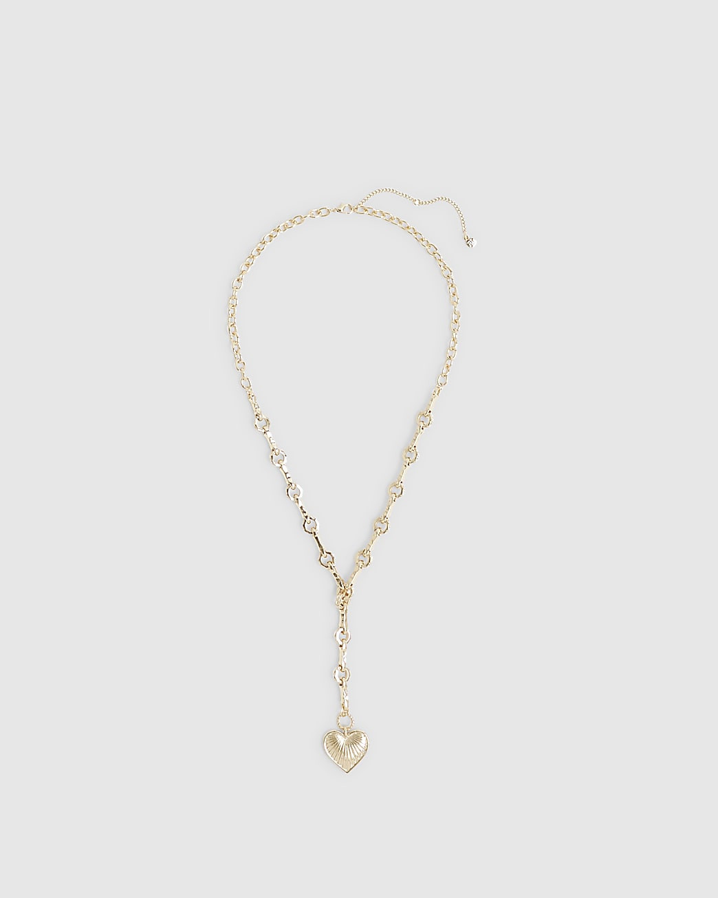 Gold Ridged Heart Pendant Necklace | River Island UK & IE