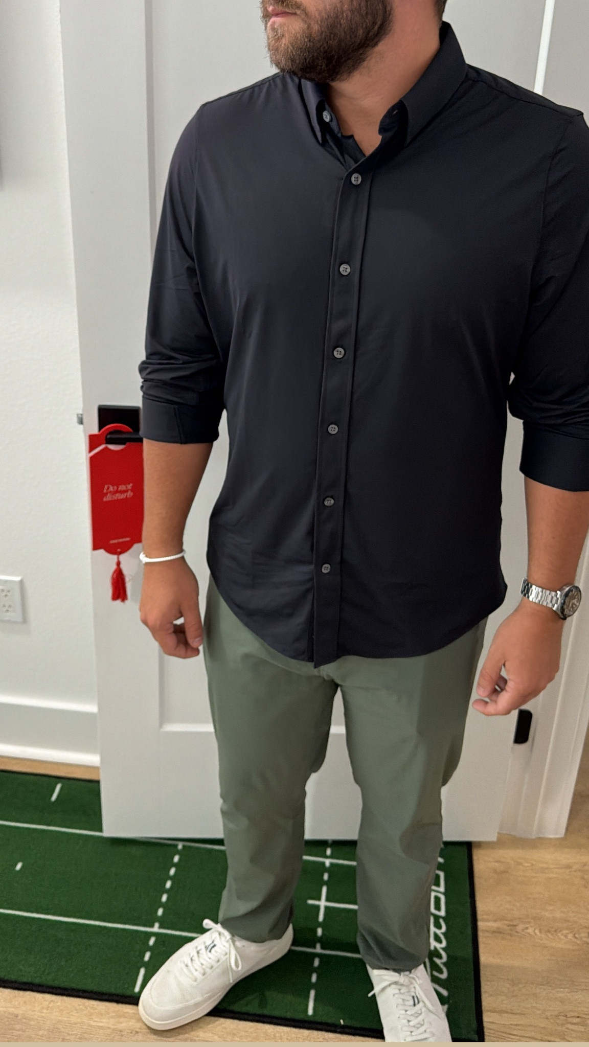 Joey wears this outfit in different colors just about everyday! It’s the @rhone slim fit commuter shirt in large (size up) and the commuter pants in green (TTS). His sneakers @rothys