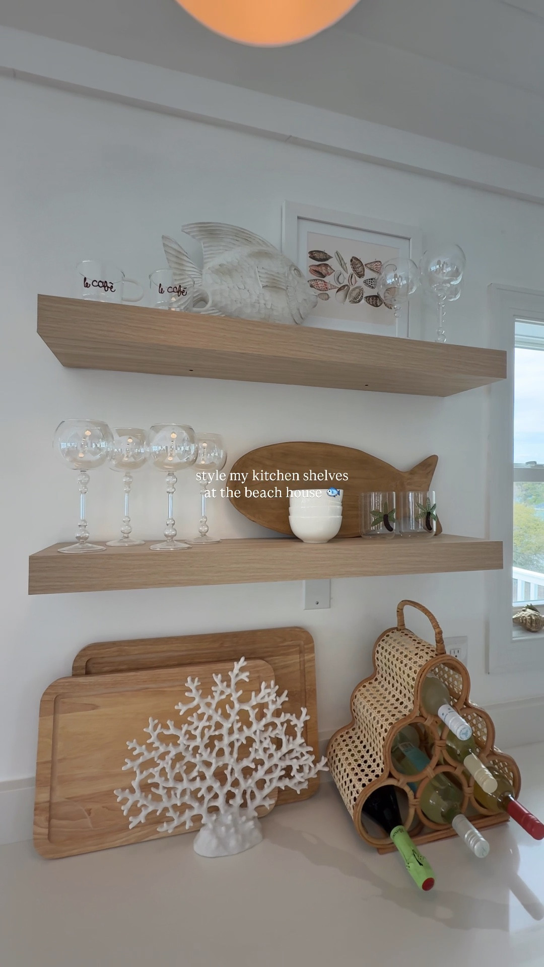 shelf styling: beach kitchen edition 🐟 | *there used to be a cabinet here and I decided to take it down and install these floating shelves, best decision + such a fun space to style 🐚

#beachhouse #shelfstyling #kitchendesign #kitcheninspo 

#LTKSeasonal #LTKHome