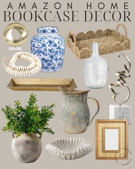 Amazon bookcase decor ✨ mix woven and glass to bring depth to your home! 

Bookcase styling, coffee table decor, bookcase decor, console table styling, decorative accessories, pitcher, woven tray, glass jar, vase, faux plant, sculpture, wooden beads, gold tray, gold accents, ginger jar, Living room, bedroom, guest room, dining room, entryway, seating area, family room, Modern home decor, traditional home decor, budget friendly home decor, Interior design, shoppable inspiration, curated styling, beautiful spaces, classic home decor, bedroom styling, living room styling, dining room styling, look for less, designer inspired, Amazon, Amazon home, Amazon must haves, Amazon finds, amazon favorites, Amazon home decor #amazon #amazonhome

#LTKFindsUnder50 #LTKHome #LTKStyleTip
