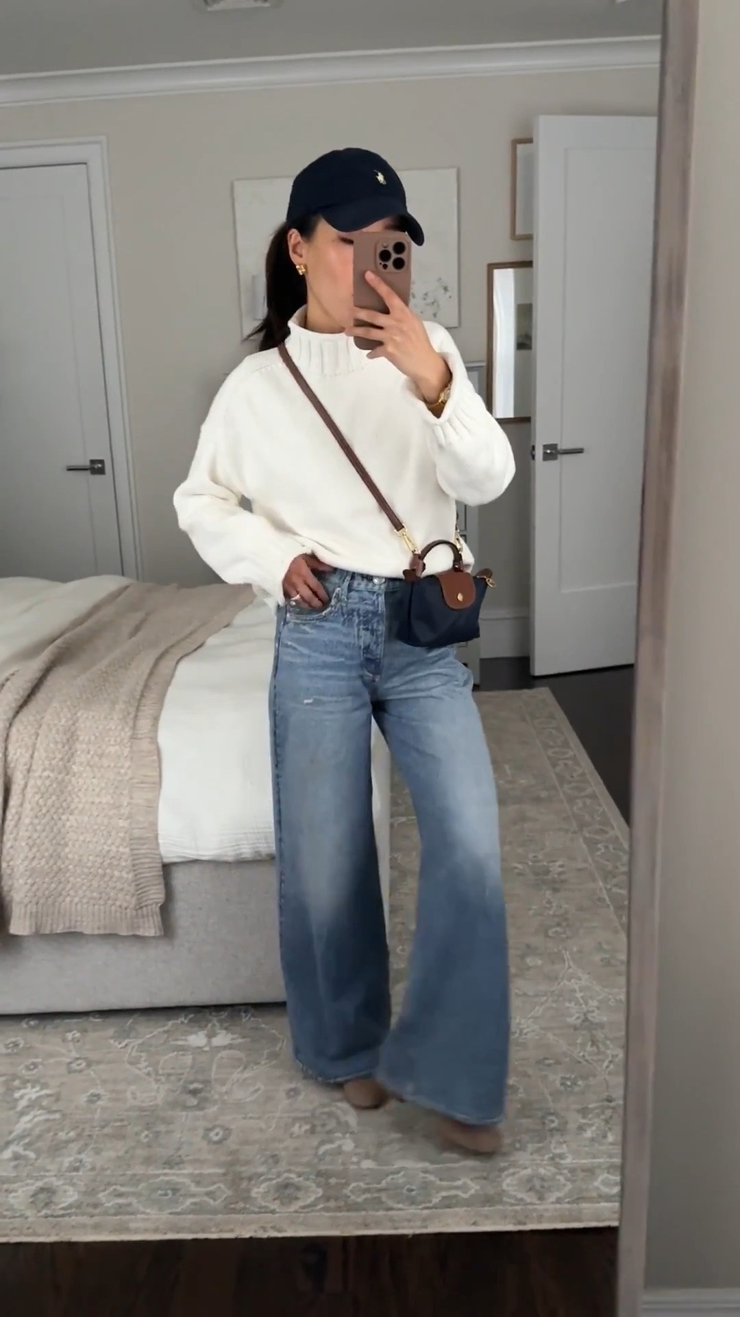 Color restocked! READ below for denim sizing👇if you’re 5 ft or shorter, I also linked their shortest 26.5” style I love (scarlet wash) to wear with flats 
• Jcrew sweater xxs, oversized slouchy fit, thicker knit, shrinks a little in dryer
• Rag and Bone “Miramar Sofie Ankle" jeans sz 23 in Minetta. Runs big so go down 1 size at the waist. “ankle” is long with a 30” inseam that I machine dried to shrink to 27.5”.
To shorten: All Miramar styles shrink in length if machine dried. I machine dried on medium for 20 min increments and checked til length was perfect
If you are very petite then get their Andi Cropped style linked below with 26.5” inseam but KEEP out of machine dryer 
• Gentle Souls booties 5.5, size up half if between sizes. since the front toe felt a little narrow across. Very comfy 

• Longchamp mini bag with Amazon detachable strap kit

• Polo hat

Easy mom outfit, spring style , petite friendly sweatpants jeans, chunky sweater

#ltkootd #ltkmomlife #ltkpetite