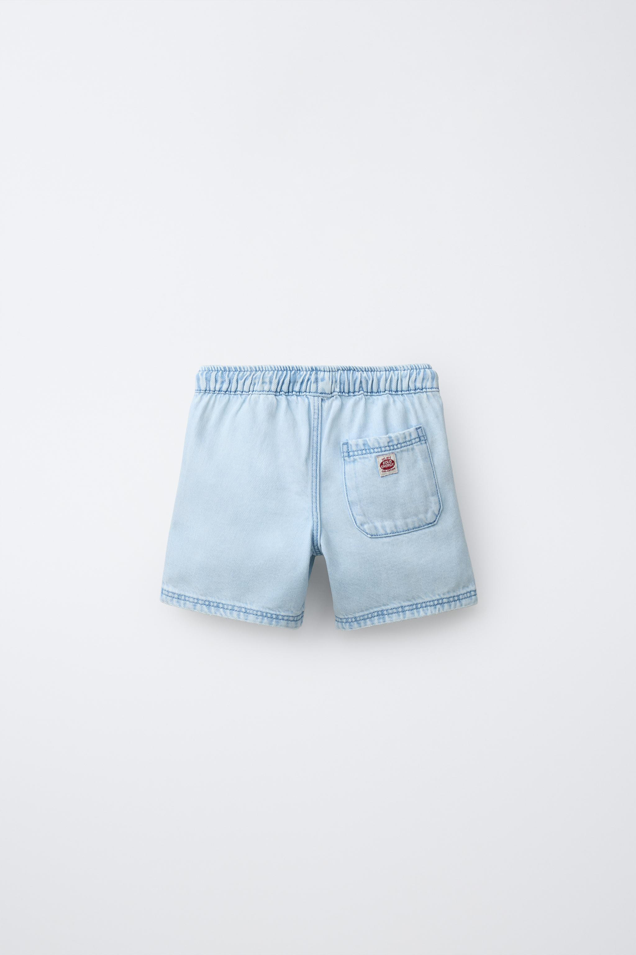 Denim shorts with elastic waistband and adjustable front drawstring. Front pockets and back patch... | Zara US