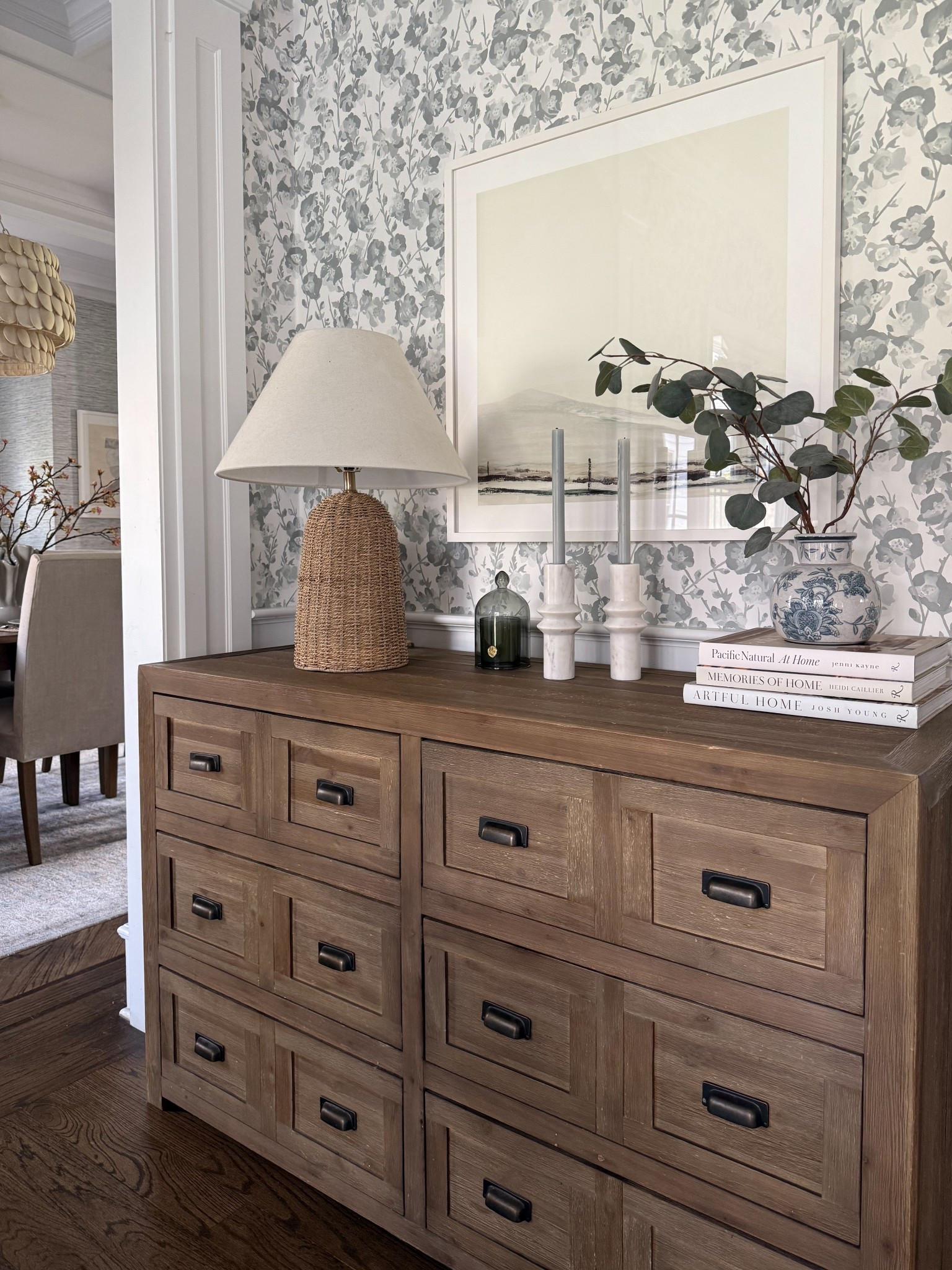 Breakfast nook and dining room inspo. Love a statement wallpaper! I have our entire breakfast nook done in this design and it’s stunning. Woven Target table lamp, marble candlesticks, taper candles I stock up on and a cute little Amazon vase!! 

#LTKSaleAlert #LTKHome #LTKSeasonal